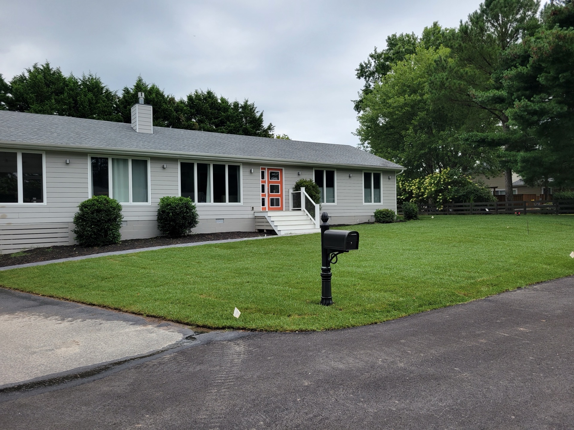 Pristine lawn and landscaping by B&B Property Maintenance